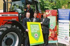Budgens Red Tractor campaign launch, seated on tractor: Tim Bennett, NFU president; standing, from left to right Barry Williams, MBL trading director, David Clarke, chief executive, Assured Food Standards, and David Sleath, sales director, Massey Ferguson