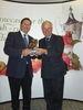 Robert Mitchell collects the award for Best All Round Exhibit from NFS president Michael Jack