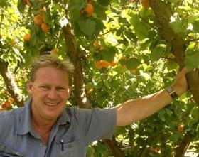 Grower Mark Jackson of Jackson Orchards with apricots