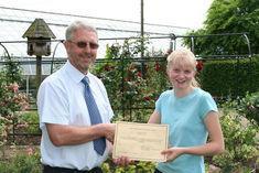 Martin Stimson - Head of Horticulture at Writtle College presenting the Scholarship certificate to Sarah Tull