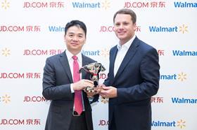 Walmart CEO Doug McMillon with JD.com CEO Richard Liu on October 20, 2016