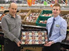 Chris Durnford handed his first case of cherry tomatoes to Asda produce manager Shaun Grey