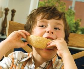 Child eating melon