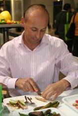 James Boyd prepares finger limes at Fruit Logistica