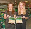 Co-op buyer Leah Willcock and category product manager Kat O'Flanagan celebrate the arrival of the product in store