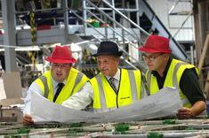 (L to R) Kevin Imrie, site manager, Eric Ritchie, general manager and George Elder, production manager, examine the plans for Branston's new look Abernethy site