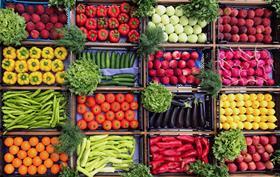 Generic mixed vegetables and fruit in boxes birds eye view