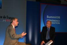 Rae, left, makes his point to ACS Summit 06 chairman John Waite, of Radio 4's You and Your's