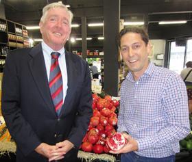 AU Melbourne retailer Damian Toscano (right) with Pomegranate Council  Manager Tom Tjerandsen
