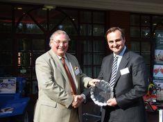 Andy Allen (right), the new Asparagus Growers' Association chairman, presenting Victor Aveling with a silver plate