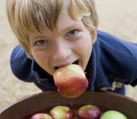 Child apple bobbing