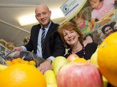 Dennis Hutchinson, managing director of JR Holland Food Services, with Carol Taylor, senior fundraiser of Children North East