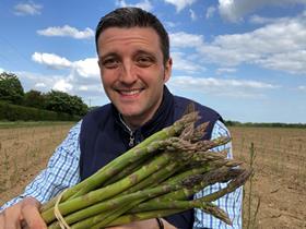 Jamie Petchell with Guelph Eclipse asparagus spears May 2018