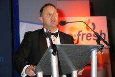 Fresh Direct md David Burns presenting the award