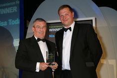 Simon Martin (right), sales and marketing director at QV Foods, presents the QV Fresh Approach Convenience Retailer of the Year award at Re:fresh 2009 to Colin Tunstall, trading controller for fresh food at Nisa-Today's