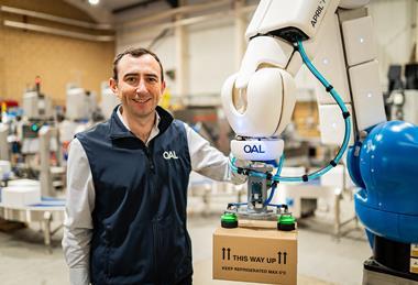 Jake Norman with one of OAL's fenceless robots