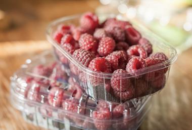 Raspberries in plastic punnets