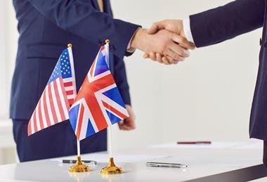 US UK agreement flags handshake