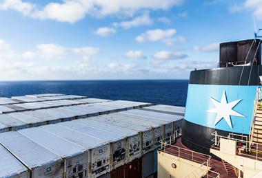 Maersk logo and containers on vessel MUST CREDIT Mariusz - Adobe Stock