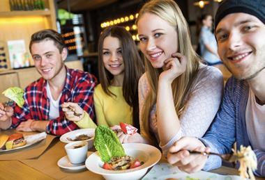 Gen Z eating in cafe