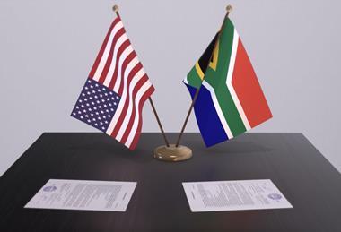 USA South Africa flags table agreement
