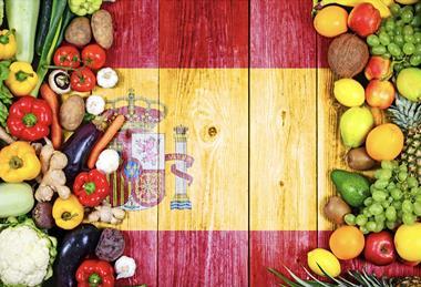 Mixed Spanish fruit and vegetables on flag