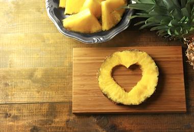 Pineapple cut out heart chopping board Fyffes
