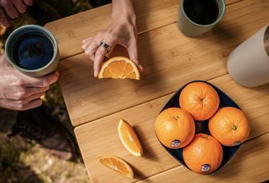 Sunkist oranges on table