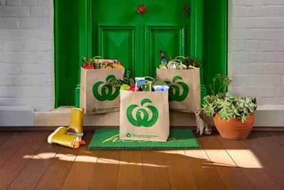 Three Woolworths grocery bags delivered to customers home