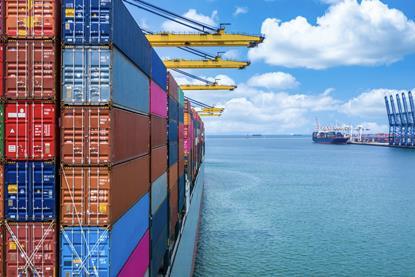 Generic side of container vessel at port Adobe Stock