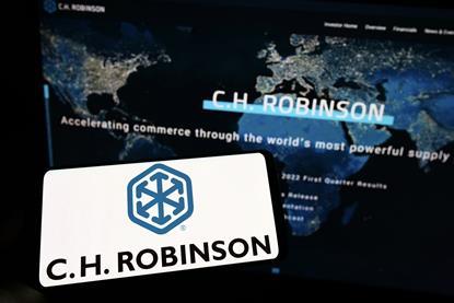 CH Robinson logo on phone and computer screen MUST CREDIT Timon - Adobe Stock