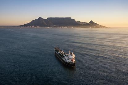 Container ship Port of Cape Town sunset Adobe Stock