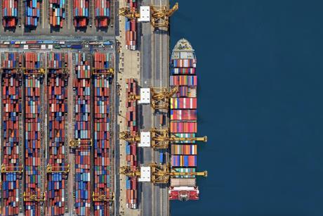 Top down view of generic container ship at port