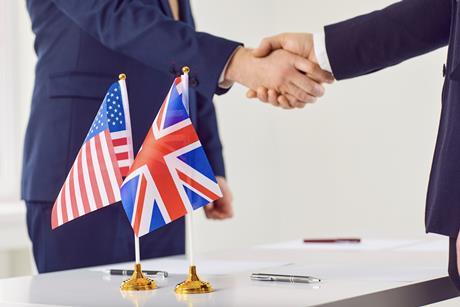 US UK agreement flags handshake