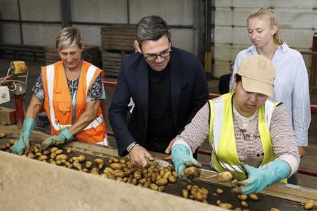Andy Burnham inspects potatoes at FG Pryor & Son
