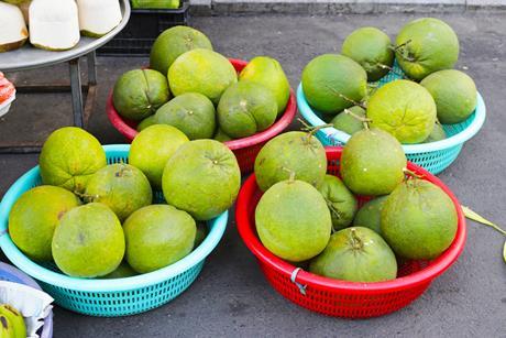 Vietnamese pomelo in baskets at a local market