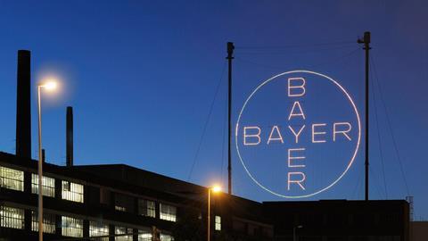 Bayer cross in Leverkusen at night,default