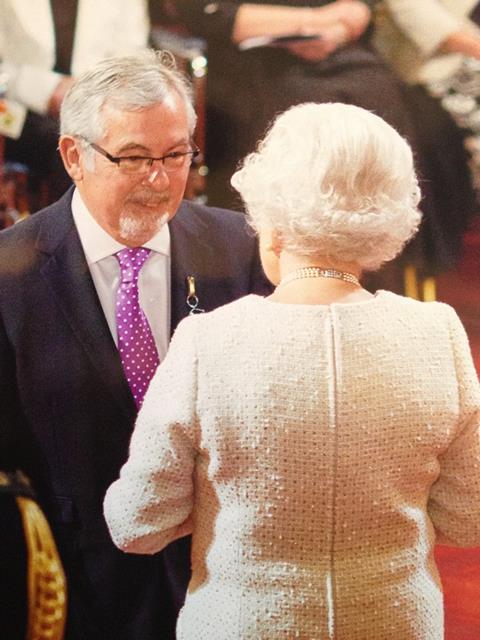 Peter Fowler receives his MBE from HM The Queen