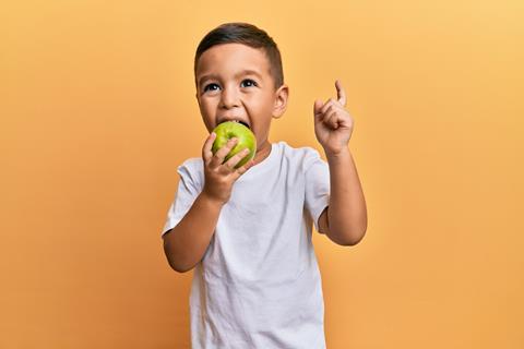 Child eating apple
