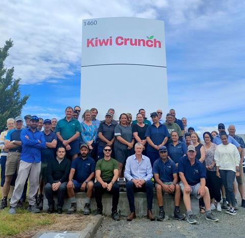 Kiwi Crunch CEO Andrew Common (front middle right), MNF shareholder Wade Glass (front middle left) and staff celebrate the rebrand at the group’s Omahu Road head office site