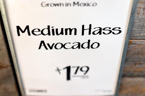 AdobeStock_572462793 Mexico avocado price sign