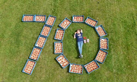 Benjamin Byers (aged 9) celebrating the start of Scotty Brand's strawberry season at Bruce Farms