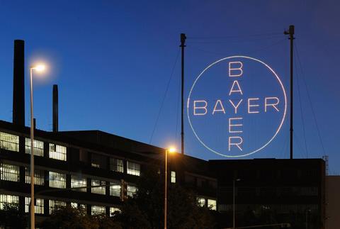 Bayer cross in Leverkusen at night - Bayer AG