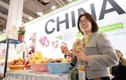 Chinesische Ausstellerin auf der Fruit Logistica 2024