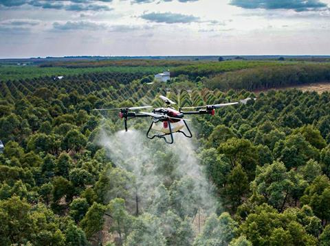 XAG drone deployed above durian orchard in Vietnam