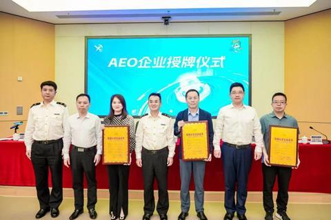 Joy Wing Mau (third from right) receives an AEO Enterprise Award from Shenzhen Customs as one of the three enterprises in Shenzhen obtaining AEO Advanced Certification