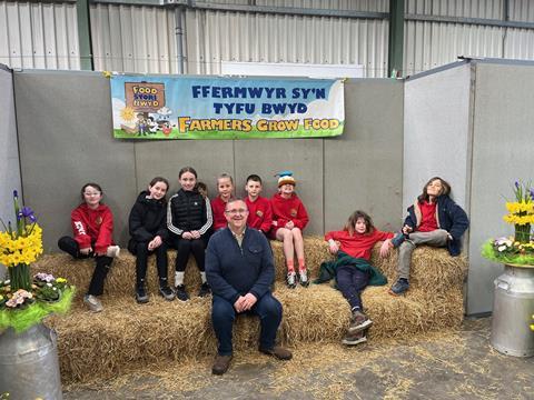 Adam Thorne (centre) Pembrokeshire Agricultural Society’s President was one of the farmers who volunteered their time to talk to school children