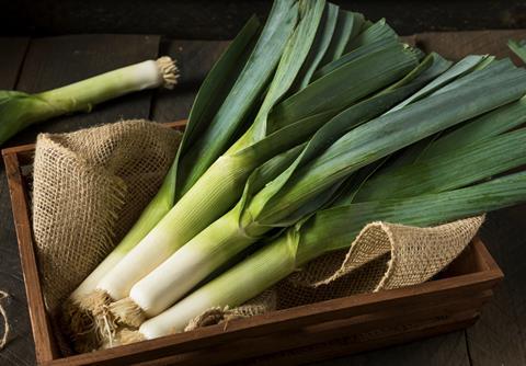 Organic leeks in box Adobe Atock