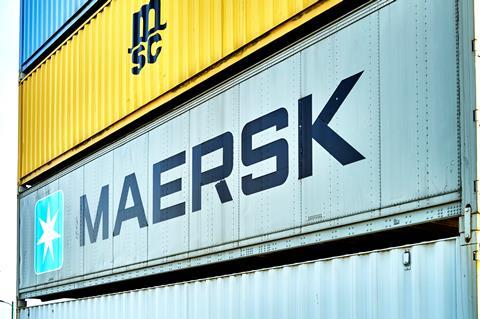 MSC and Maersk shipping containers stacked Adobe