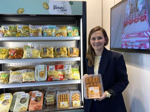 Ellen Nemegheer showing off The Potato Chef's sweet potato croquettes
